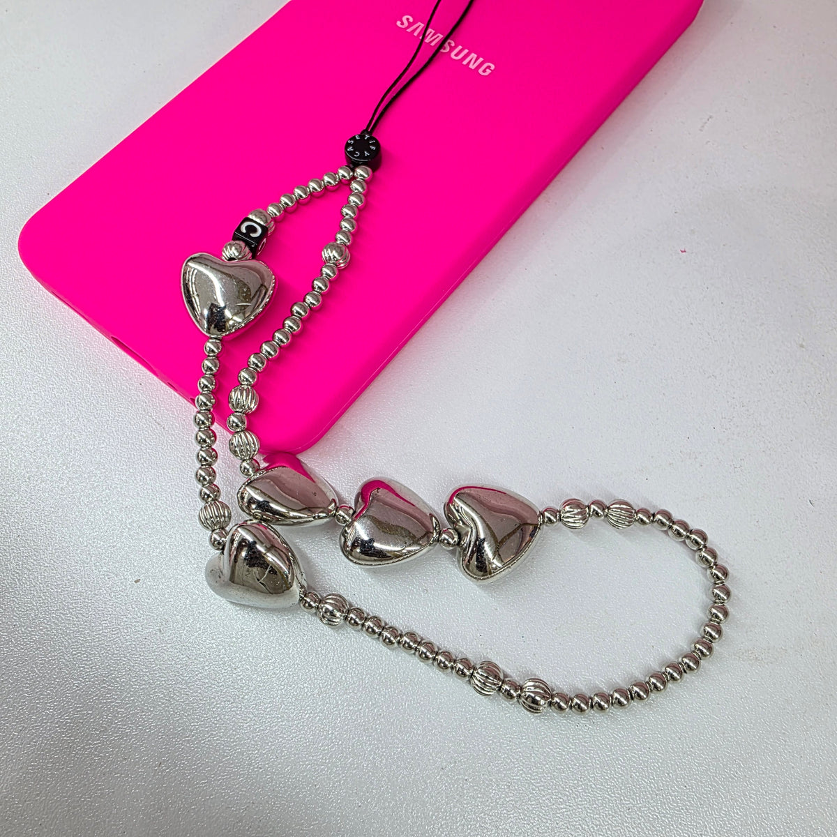 Silver phone charm